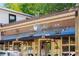 Charming cafe exterior with inviting awning, vintage signage, and sunlit windows at 611 Pickett Se St, Atlanta, GA 30316