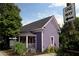 Charming home with inviting porch, lush landscaping, and a 'One Way' sign adds character at 611 Pickett Se St, Atlanta, GA 30316