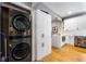 Modern kitchen featuring stainless steel washer/dryer and updated appliances at 611 Pickett Se St, Atlanta, GA 30316