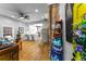Open-concept living room showcasing hardwood floors, eclectic décor, and seamless flow to kitchen at 611 Pickett Se St, Atlanta, GA 30316