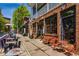 A street view of Jen Chan's restaurant with outside seating and brick facade at 611 Pickett Se St, Atlanta, GA 30316