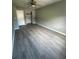 The bedroom features updated floors, neutral paint and closet at 5388 Robertson Path, Lithonia, GA 30038