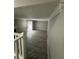 View of the large living room featuring an exit door to the outside at 5388 Robertson Path, Lithonia, GA 30038