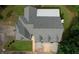 Aerial shot of the house showing the driveway and gray roof at 80 Surrey Chase Drive, Social Circle, GA 30025