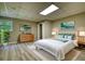 Finished basement bedroom features new floors, modern decor, and ample closet space at 80 Surrey Chase Drive, Social Circle, GA 30025