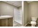 This bathroom features a modern vanity and a shower at 80 Surrey Chase Drive, Social Circle, GA 30025