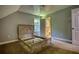 This is an empty bedroom with carpet and a bed frame and headboard at 80 Surrey Chase Drive, Social Circle, GA 30025