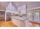 Spacious kitchen with a large island, stainless steel appliances and deck access at 80 Surrey Chase Drive, Social Circle, GA 30025
