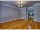Beautiful living room with view of kitchen area at 80 Surrey Chase Drive, Social Circle, GA 30025