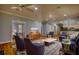 Bright living room with hardwood floors, ceiling fan, and comfortable seating at 80 Surrey Chase Drive, Social Circle, GA 30025