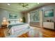 Tranquil main bedroom with a plush bed, soft decor, and natural light at 80 Surrey Chase Drive, Social Circle, GA 30025