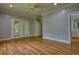 Main bedroom with hardwood floors, gray walls and ceiling fan at 80 Surrey Chase Drive, Social Circle, GA 30025