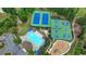 Overhead view showing the community's fantastic amenities, including a pool, courts, and playground at 1099 Sandy Bank Ct, Auburn, GA 30011