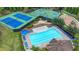 Aerial view of the pool, tennis courts, basketball courts, and playground in the community at 1099 Sandy Bank Ct, Auburn, GA 30011