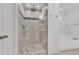 Luxurious bathroom featuring a glass shower and relaxing soaking tub at 1099 Sandy Bank Ct, Auburn, GA 30011