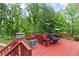 Enjoy the outdoors on this deck with a swing, surrounded by a lush wooded area at 1784 Brookstone Nw Ct, Acworth, GA 30101