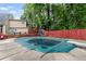 Relax and entertain in this backyard featuring a covered pool and lots of seating at 1784 Brookstone Nw Ct, Acworth, GA 30101