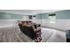 This basement features a theater arrangement and stylish wainscoting at 1784 Brookstone Nw Ct, Acworth, GA 30101