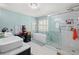 Bathroom features modern shower, separate tub, and vanity area at 1784 Brookstone Nw Ct, Acworth, GA 30101