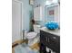 Bathroom features unique sink, decorative elements, and neutral decor at 1784 Brookstone Nw Ct, Acworth, GA 30101