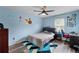 This bedroom offers a dedicated workspace, ideal for study or remote work at 1784 Brookstone Nw Ct, Acworth, GA 30101
