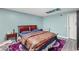 Cozy bedroom with a queen-sized bed and a colorful rug, providing comfort at 1784 Brookstone Nw Ct, Acworth, GA 30101