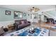 Inviting living room with hardwood floors, comfortable seating, and open layout at 1784 Brookstone Nw Ct, Acworth, GA 30101