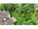 Serene backyard with a manicured lawn, established trees, and a peaceful ambiance at 2503 Regency Lake Dr, Marietta, GA 30062