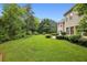 Expansive backyard featuring lush greenery and manicured landscaping, perfect for outdoor enjoyment at 2503 Regency Lake Dr, Marietta, GA 30062