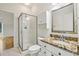 Bright bathroom features a glass enclosed shower and granite vanity at 2503 Regency Lake Dr, Marietta, GA 30062