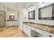 Primary bath with double sinks, granite countertops, walk-in shower, and tile flooring at 2503 Regency Lake Dr, Marietta, GA 30062