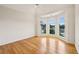 Spacious bedroom boasts beautiful hardwood floors and a bay window with arched windows at 2503 Regency Lake Dr, Marietta, GA 30062