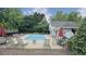 Community pool featuring lounge chairs, umbrellas, and a well-maintained pool area at 2503 Regency Lake Dr, Marietta, GA 30062