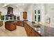 Spacious kitchen features a large island, granite counters, stainless appliances, and abundant natural light at 2503 Regency Lake Dr, Marietta, GA 30062