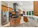 This spacious kitchen features granite counters, stainless steel appliances, and custom cabinetry at 2503 Regency Lake Dr, Marietta, GA 30062