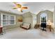 Spacious bedroom with vaulted ceilings, ceiling fan and two large windows providing ample natural light at 3915 Woolbridge Way, Marietta, GA 30062