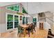 Dining room with a vaulted ceiling, large windows and hardwood flooring is perfect for entertaining Gathering and friends at 3915 Woolbridge Way, Marietta, GA 30062