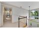 Bright hallway with chandelier and view of front door at 3915 Woolbridge Way, Marietta, GA 30062