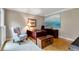 This spacious home office features elegant decor, providing a serene and productive workspace for remote work at 3915 Woolbridge Way, Marietta, GA 30062