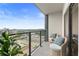 Balcony showing seating, glass railing, and city views at 1280 W Peachtree Nw St # 3208, Atlanta, GA 30309