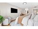 Spacious bedroom featuring a comfortable bed, stylish decor, and a relaxing atmosphere at 1280 W Peachtree Nw St # 3208, Atlanta, GA 30309