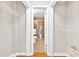 Walk-in closet with ample storage space, organized shelving, and easy access to the bathroom at 1280 W Peachtree Nw St # 3208, Atlanta, GA 30309