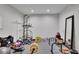 A home gym equipped with workout equipment and a large mirror at 793 Fairington Pl, Lawrenceville, GA 30044