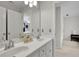 Bathroom features a double vanity, and neutral-colored walls with a walk-in closet at 793 Fairington Pl, Lawrenceville, GA 30044