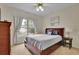 Bedroom with a neutral color scheme and lots of natural light at 793 Fairington Pl, Lawrenceville, GA 30044