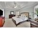 Spacious bedroom featuring tray ceilings and large windows that let in tons of natural light at 793 Fairington Pl, Lawrenceville, GA 30044