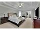 Spacious main bedroom features a tray ceiling, neutral walls, and an ensuite bathroom and walk-in closet at 793 Fairington Pl, Lawrenceville, GA 30044