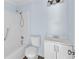 Bathroom with white tub and shower combo, toilet, and vanity at 1139 Mainstreet Valley Dr, Stone Mountain, GA 30088