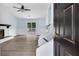 Spacious living room with new floors, a fireplace, and sliding glass doors leading to the back deck at 1139 Mainstreet Valley Dr, Stone Mountain, GA 30088