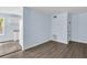 Cozy living room space with light blue walls and modern wood-look flooring at 1139 Mainstreet Valley Dr, Stone Mountain, GA 30088